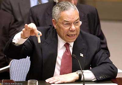 Powell holding a bottle of anthrax or cocaine