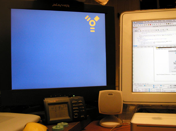 Photo of both systems with Target Disk Mode running on Mac Mini Screen
