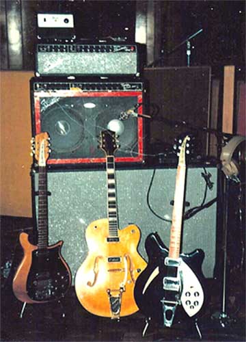 Mike's Flamin' Groovies stage and studio rig pictured at Goldstar Studio in Los Angeles. Amps are: 1965 Fender Twin Reverb with 2x12 inch JBL D120F speakers (purchased from Grateful Dead in 1966, Jerry's amp), 1965 Fender Dual Showman with 2x15 inch JBL D130F speakers. Guitars are: 1965 Rickenbacker 450 12-string, 1954 Gretsch Country Club and 1970s Rickenbacker 360 w/button pickups and Bigsby vibrato tailpiece. All guitars stereo wired.