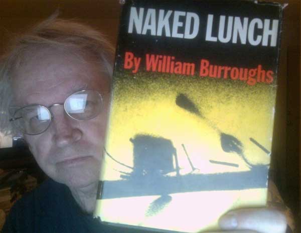 Steven Leech with one of his prize possessions ... a copy of the 1959 original first edition book, Naked Lunch by William S. Burroughs