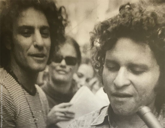 Abbie Hoffman (left) and Paul Krassner address a crowd at the 1968 Chicago Democratic National Convention.